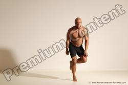 Underwear Gymnastic poses Man Black Muscular Bald Dancing Dynamic poses Academic